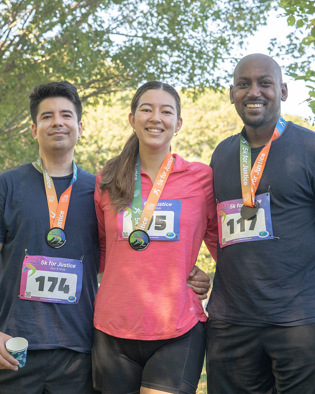 Runners celebrating at the finish